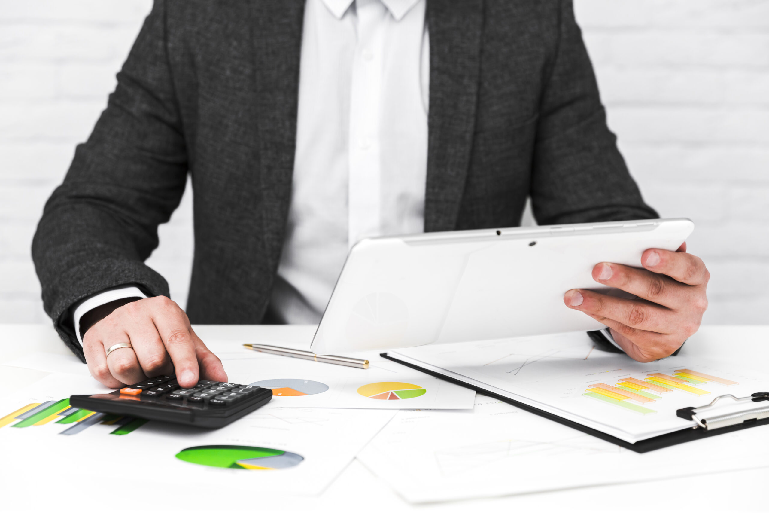 business-man-working-office-desktop Tax Preparartion